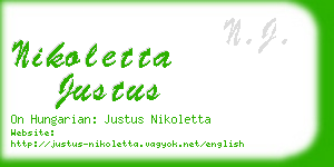 nikoletta justus business card